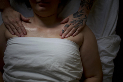 Marissa performing a neck massage